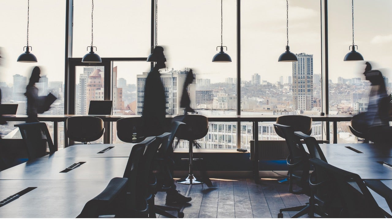 A group of people working in a modern office.